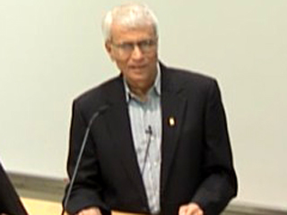 a man wearing a suit and tie