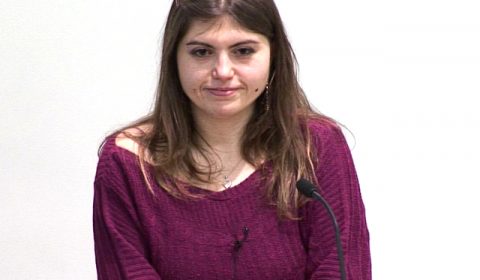 a woman smiling for the camera