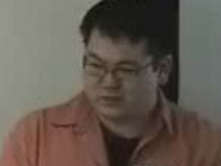 a man looking at the camera