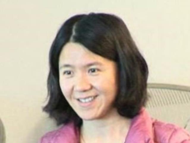 a woman smiling for the camera