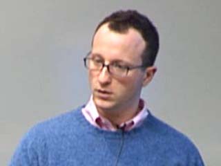 a man wearing a blue shirt