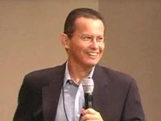 a man wearing a suit and tie