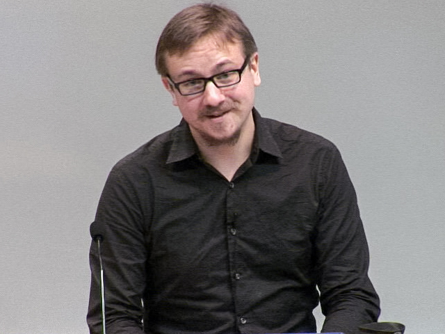 a man looking at the camera