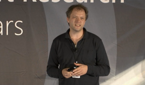 a person standing posing for the camera