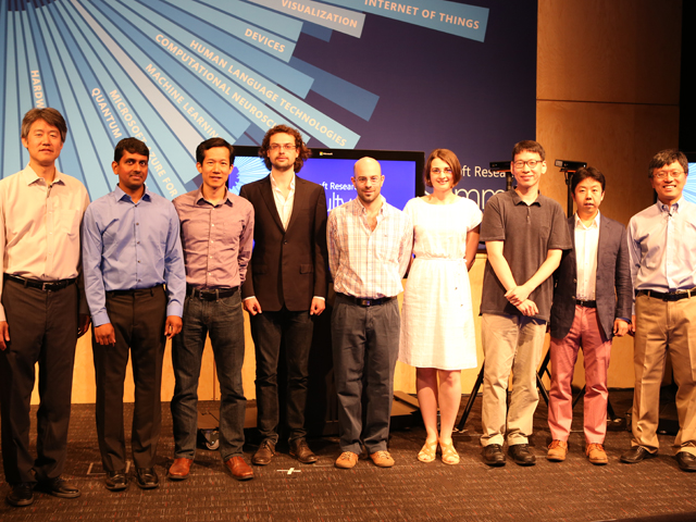 a group of people posing for a photo