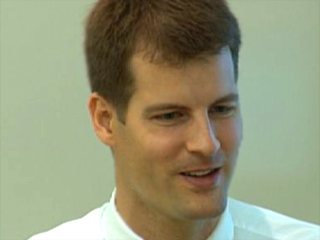 a man smiling for the camera