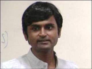 a man smiling for the camera