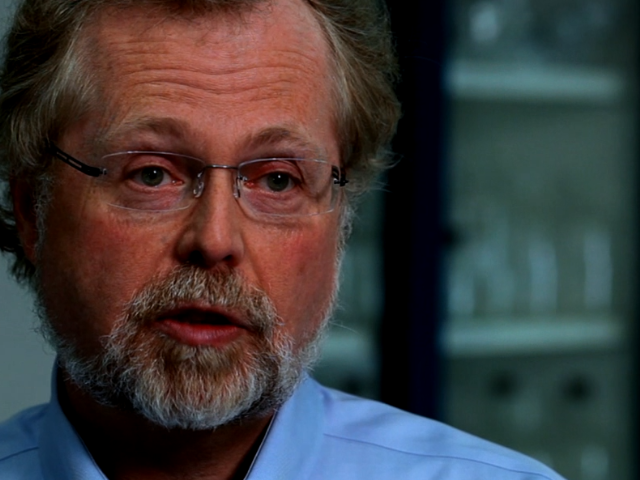 Nathan Myhrvold wearing glasses and looking at the camera