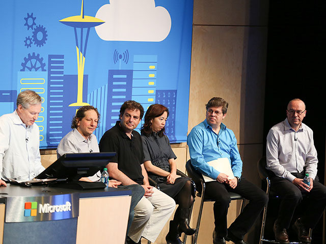 a group of people sitting at a table