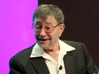 Judea Pearl wearing a suit and tie