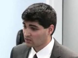 a man wearing a suit and tie