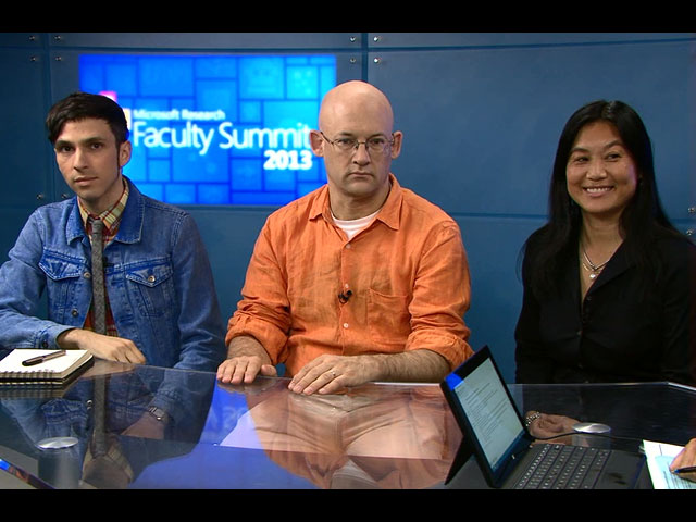 Clay Shirky, Lili Cheng sitting at a table using a laptop computer