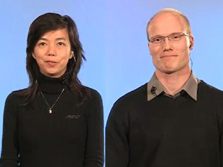 Fei-Fei Li and woman posing for a picture