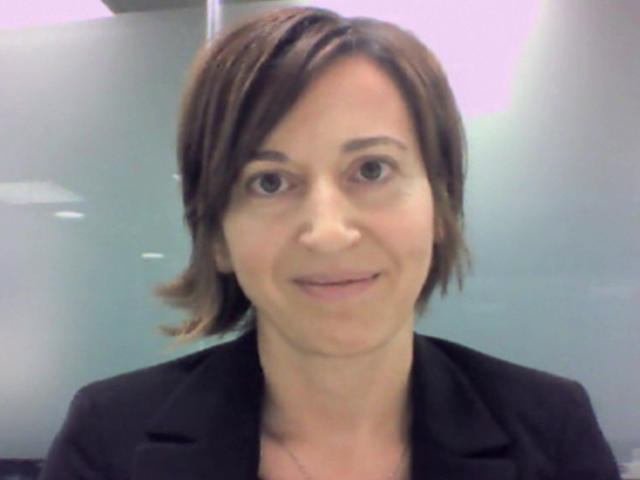 a woman smiling for the camera