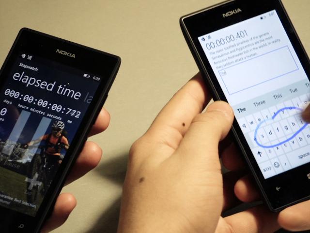 a hand holding a cellphone