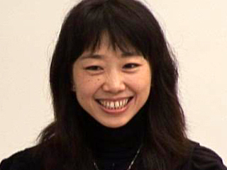 a woman smiling for the camera