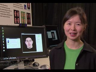 a person standing in front of a computer