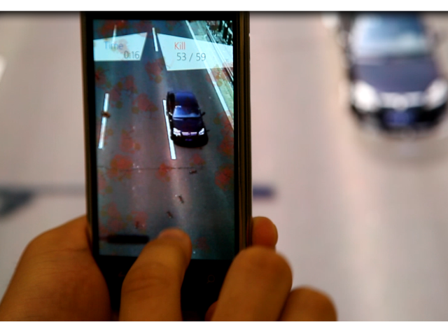 a hand holding a cell phone