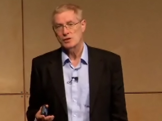 Tony Hey wearing a suit and tie