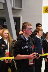 a group of people standing in a room