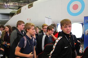 River Phoenix et al. standing in front of a crowd