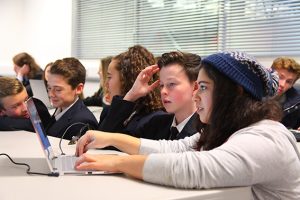 a group of people sitting at a table