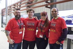 a group of people posing for the camera