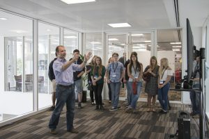 a group of people standing in a room