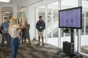 a group of people standing in front of a building