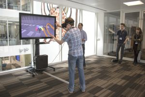 a man standing in front of a building