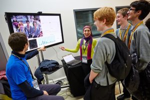 a group of people standing in a room
