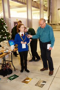 a group of people sitting at a table