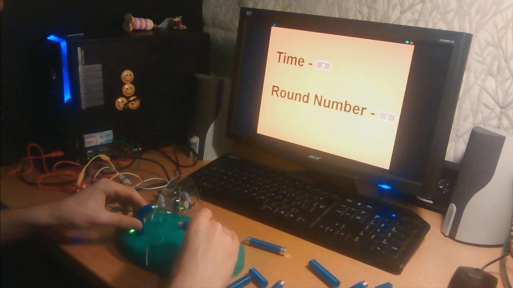 a laptop computer sitting on top of a table