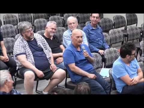 a group of people sitting around each other