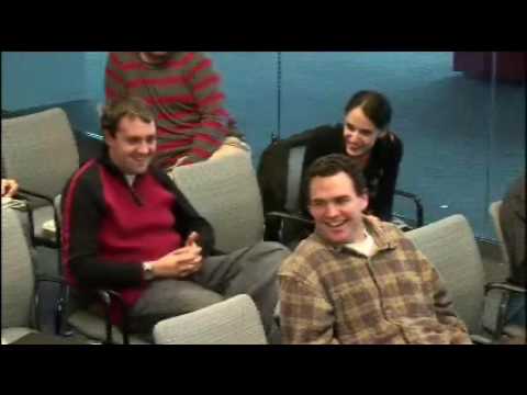 a group of people sitting at a table