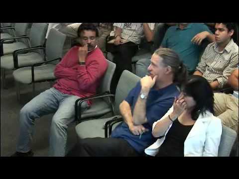 a group of people sitting in chairs
