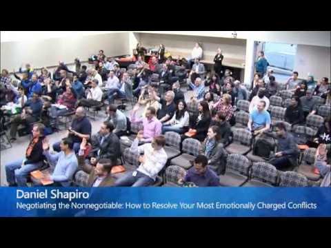 a man standing in front of a crowd