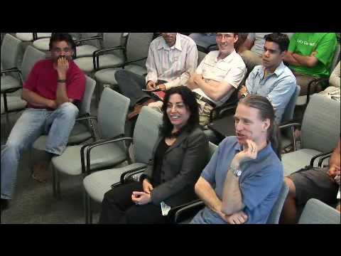 a group of people sitting posing for the camera