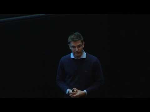 a man standing in a dark room