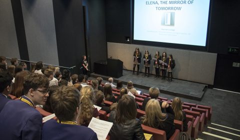 a group of people sitting in chairs