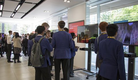 a group of people standing in a room