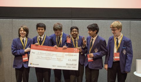 a group of people posing for the camera