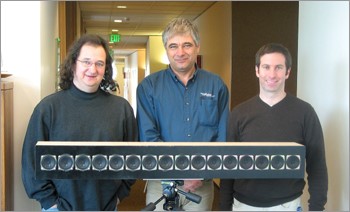 Jasha Droppo (left), Ivan Tashev (center), and Mike Seltzer display the latest version of their Personal Audio Space sound-targeting speaker array.