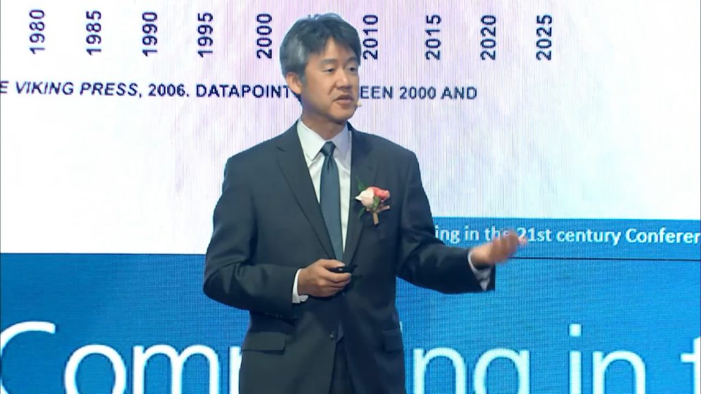 Peter Lee wearing a suit and tie