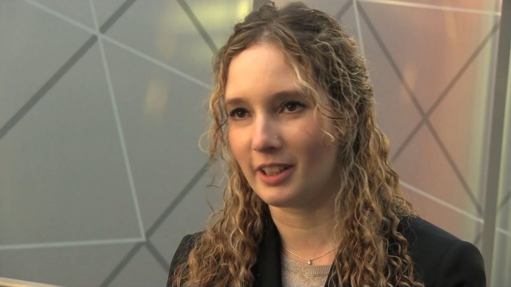 a woman smiling for the camera