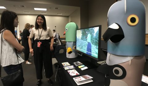 a group of people standing in a room