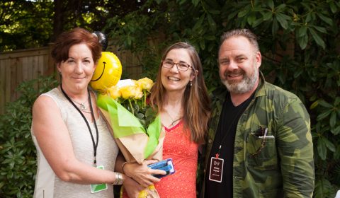 a couple of people posing for the camera