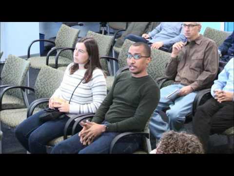 a group of people sitting in chairs