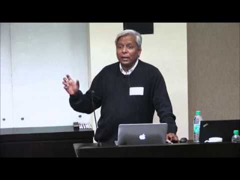 K. VijayRaghavan standing in front of a computer screen