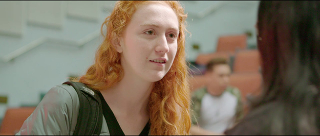 a woman looking at the camera